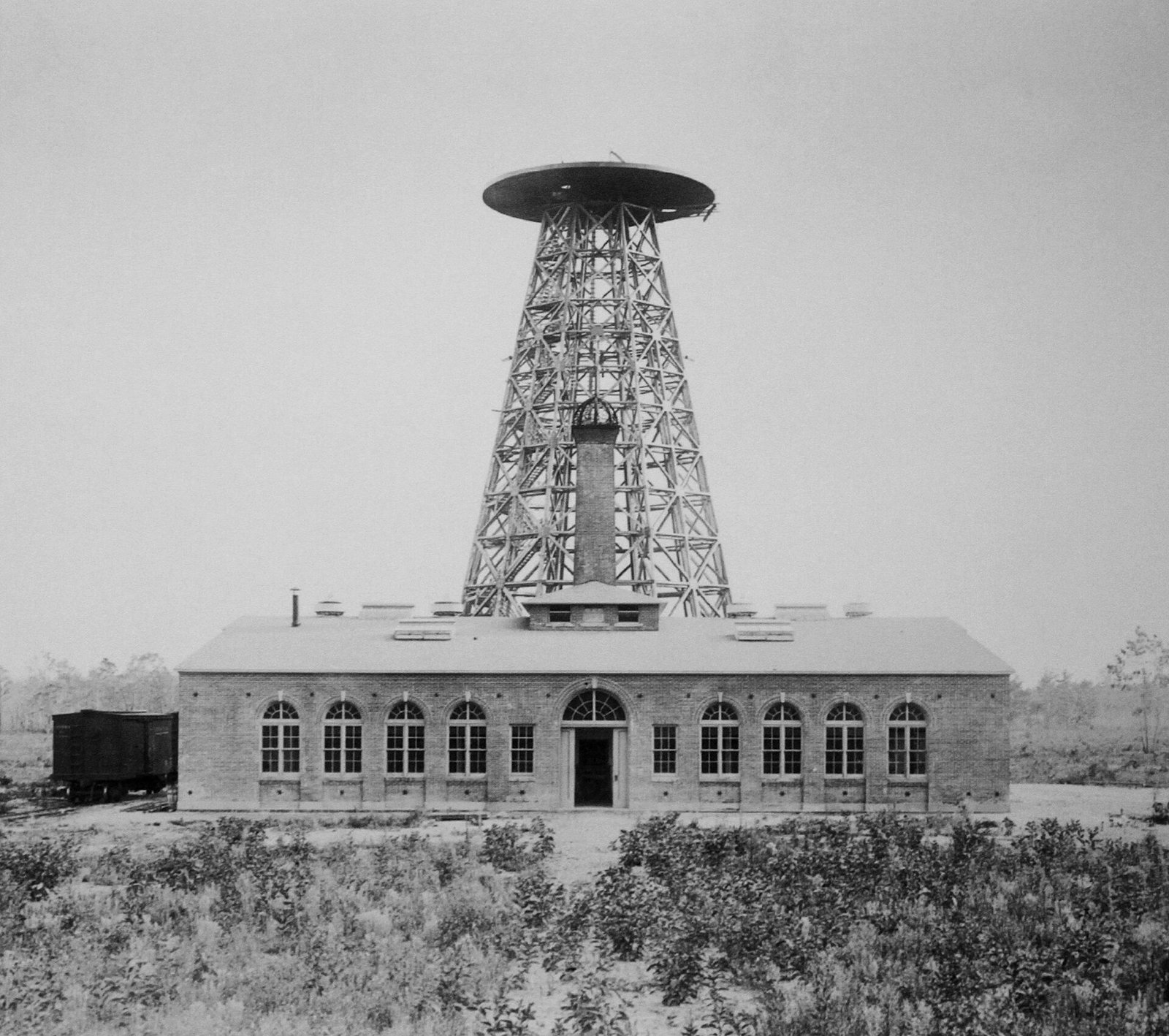The Wardenclyffe laboratory on Long Island, with the unfinished tower rising from the roof
